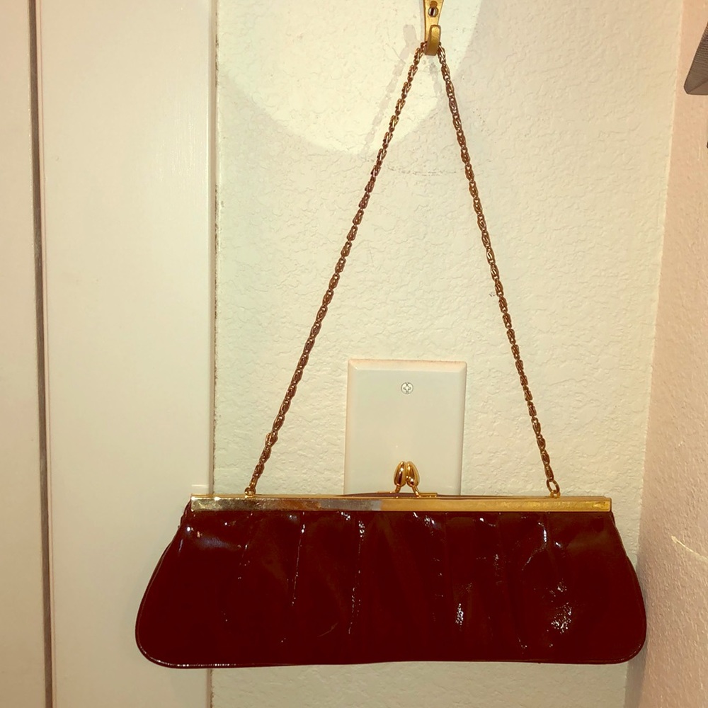 NWT chocolate patent leather clutch bag